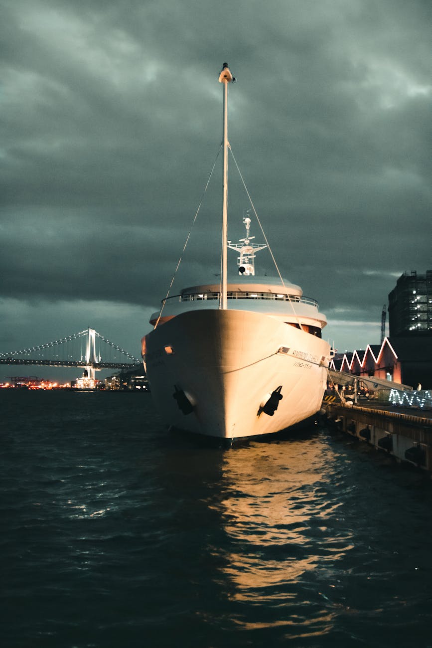 white yacht on the port