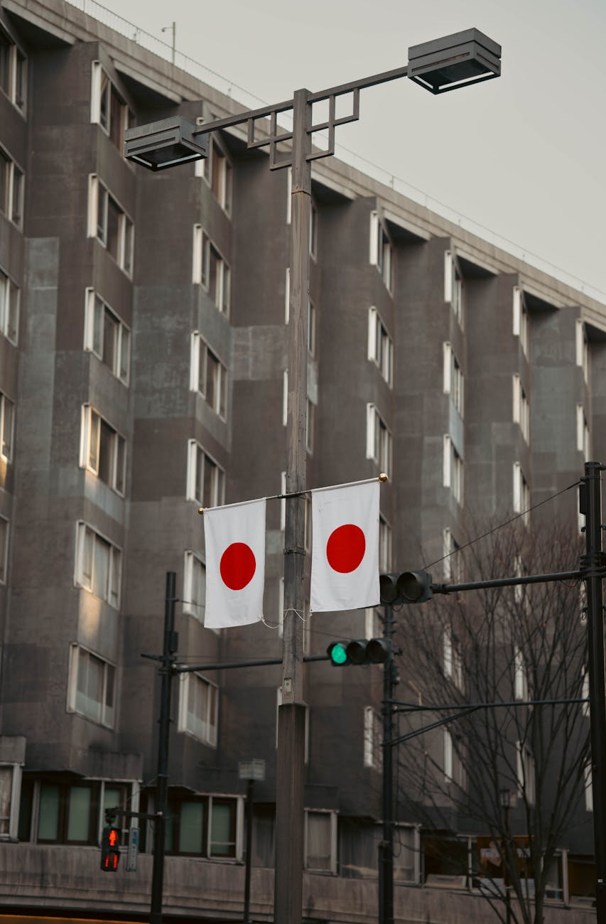 japanese flags on urban street scene